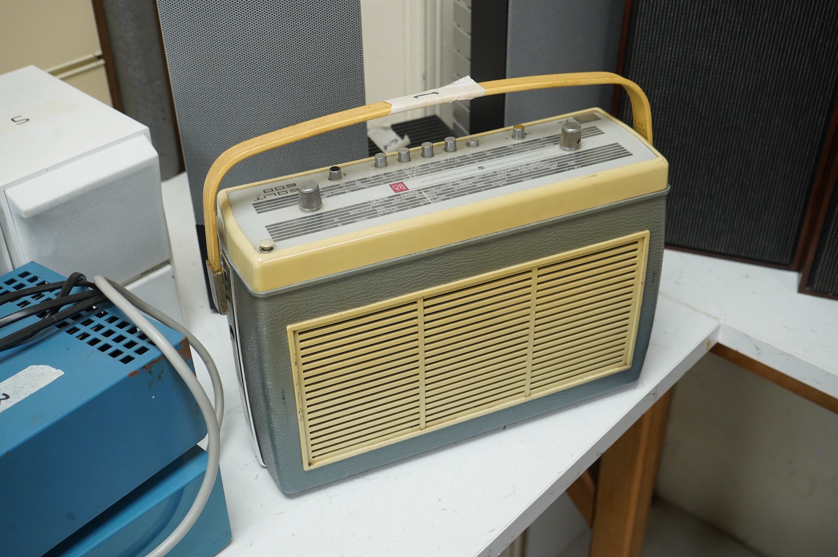 Six Bang & Olufsen items; a 1960s Beolit 600 radio, a pair of Beovox CX50s white cased shelf speakers, a pair of Beovox 1000 speakers, a Beolab 2000 speaker unit, together with two testing units (adjustable power supplie